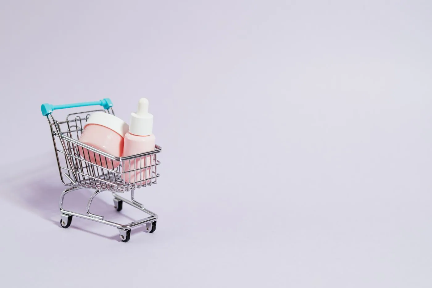 Beauty products in a shopping cart representing product pages. Photo by www.kaboompics.com on Pexels