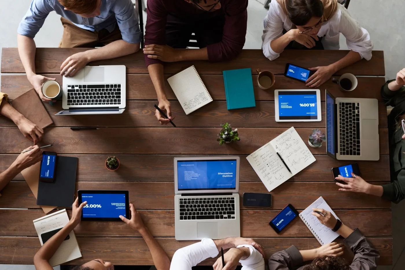 Sales team reviewing qualified energy lead reports together. Photo by fauxels on Pexels