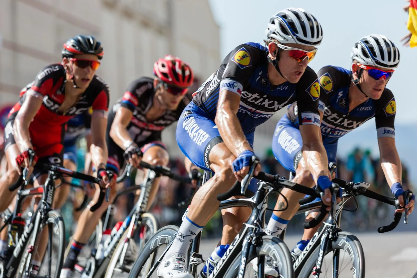 Cyclists racing in a competitive tournament event. Photo by Pixabay on Pexels