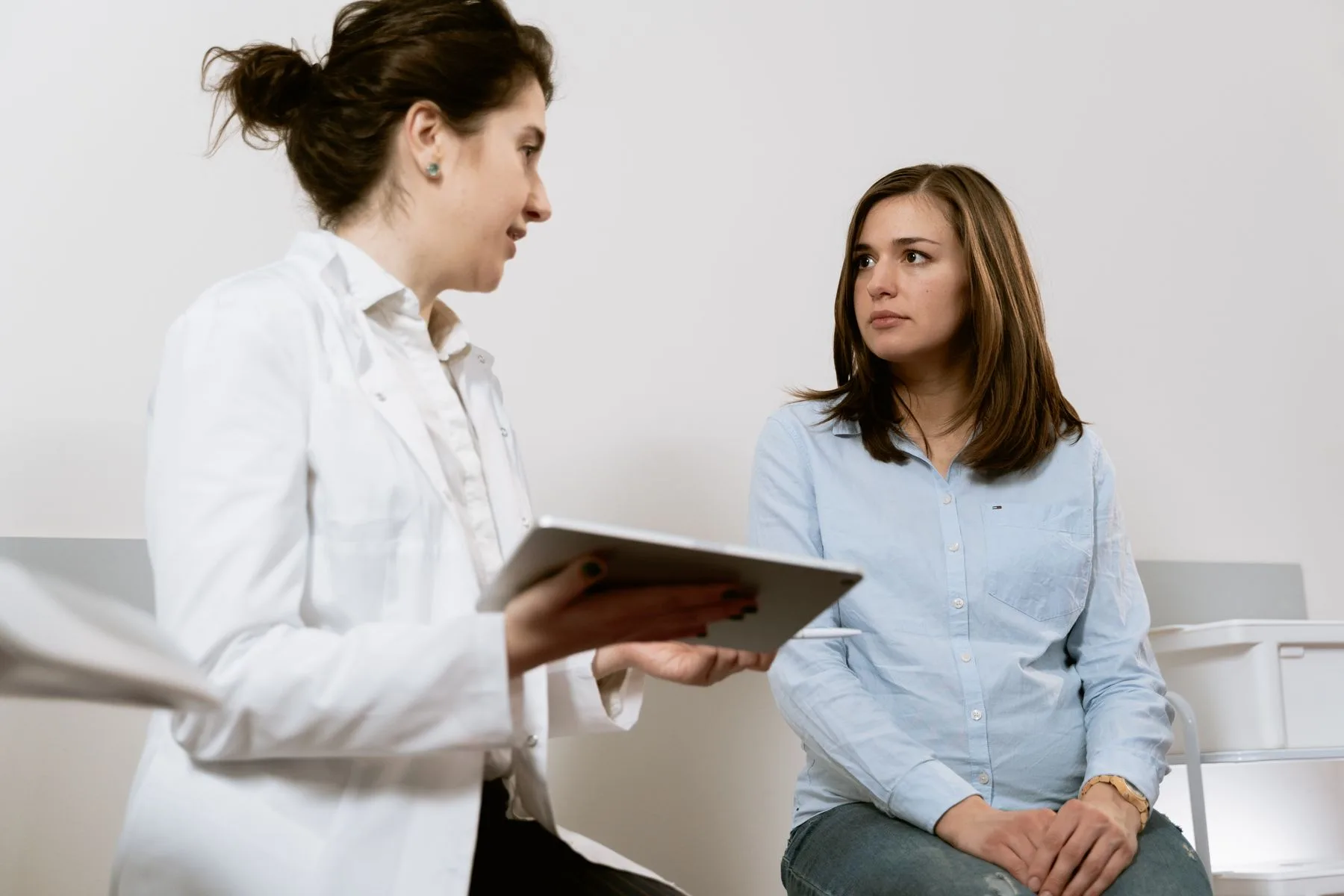 Dental team reviewing case acceptance metrics. Photo by MART PRODUCTION on Pexels