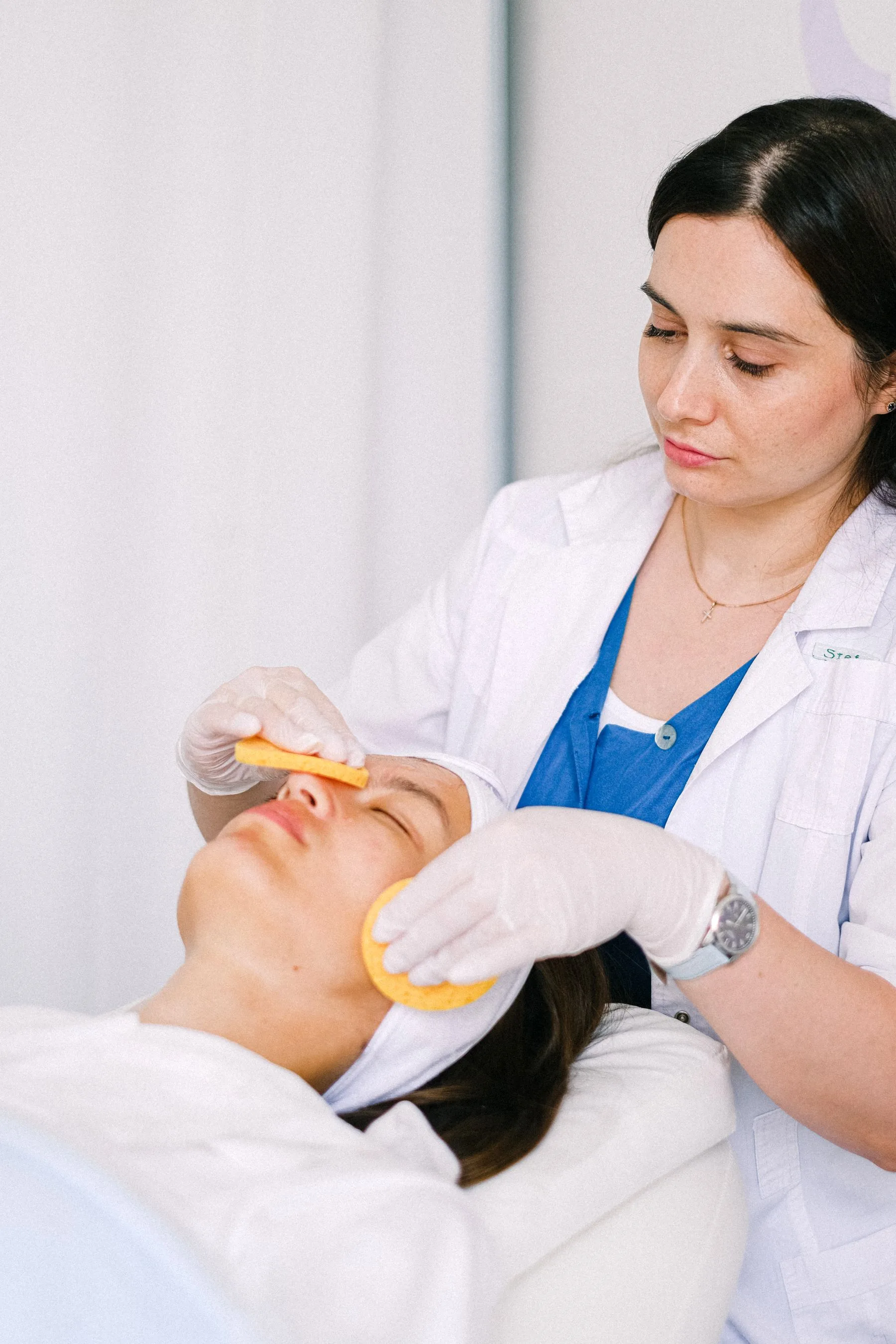 Client researching clinic options online. Photo by Anna Shvets on Pexels