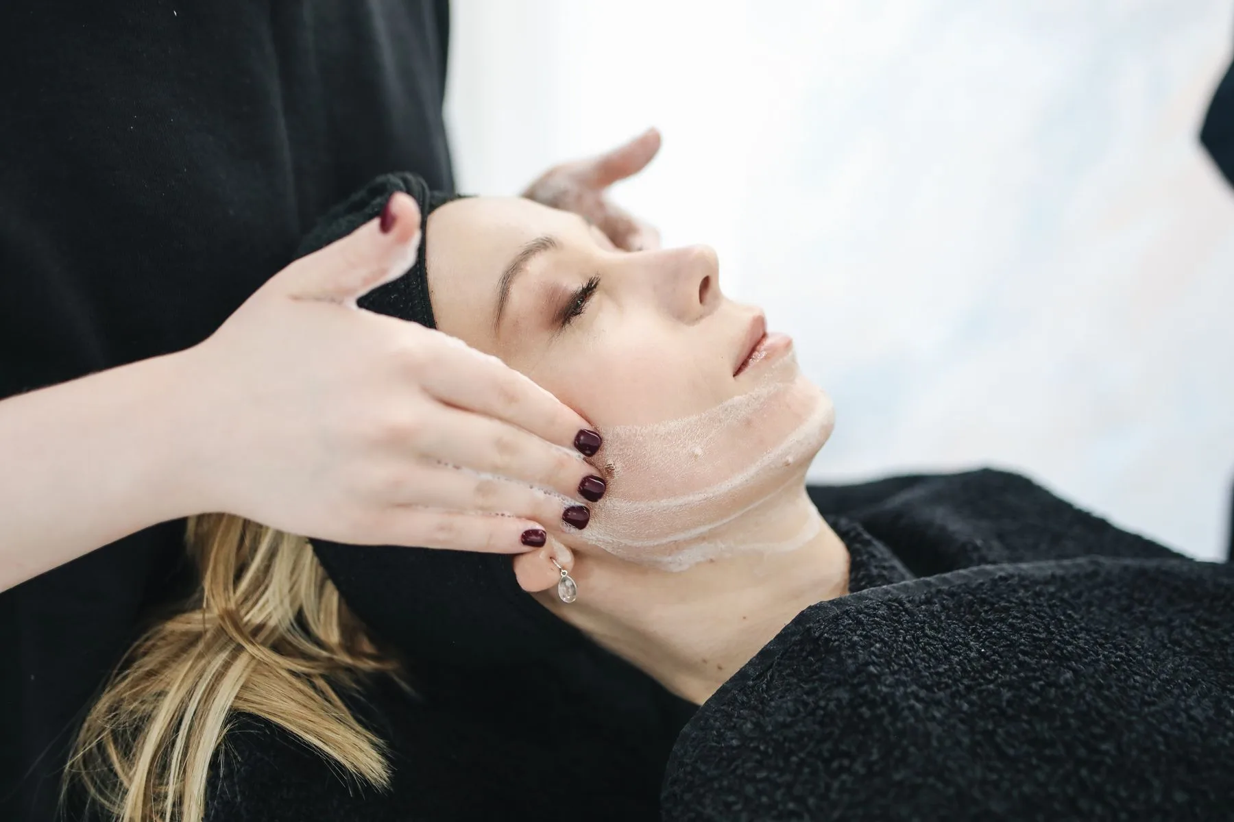 Client exploring laser and skin treatment options. Photo by Polina Tankilevitch on Pexels