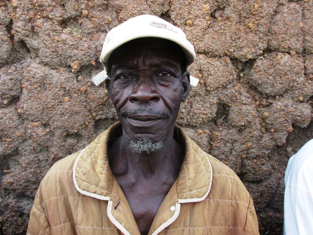 Close-up portrait of an elderly man wearing a cap in Fada-Ngourma, Burkina Faso in the UK. Photo by AFRIQUE  AYELE-Y on Pexels